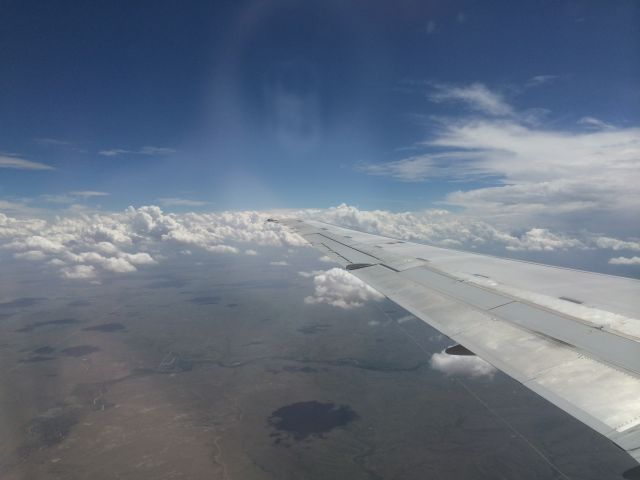 McDonnell Douglas MD-90 — - Approaching KDEN, seat 33A