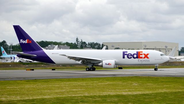 BOEING 767-300 (N135FE) - BOE586 taxis onto Rwy 16R for its B1 flight on 5.23.16. (ln 1099 / cn 42722).