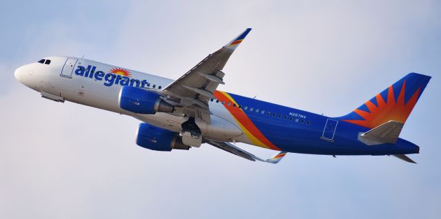 Airbus A320 (N257NV) - Brand new A320 lifting off in the cool Carolina sky, shot from the RDU parking deck, 11/18/18.