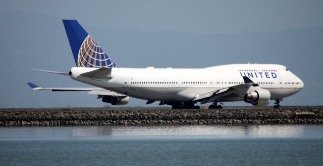 Boeing 747-400 (N178UA) - Waiting at 28L for departure 08-23-2015, however, no flight information found on Flight Aware