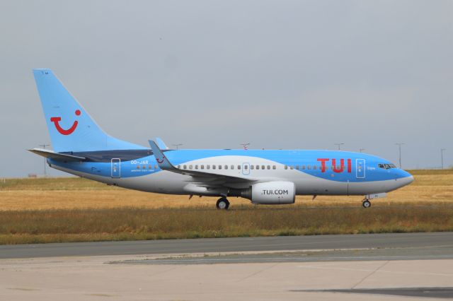 Boeing 737-700 (OO-JAR) - TUI fly Belgium (TB) OO-JAR B737-7KF [cn35150]br /Paris Charles de Gaulle (CDG). Tui fy Belgium flight TB4763 to Palma de Mallorca (PMI) taxis for a delayed take-off at an overcast Paris. br / br /Taken from Terminal 1 arrivals level.br /2018 08 09br /a rel=nofollow href=http://alphayankee.smugmug.com/Airlines-and-Airliners-Portfolio/Airlines/EuropeanAirlines/TUI-Airways-BY/i-6Nmhqp7https://alphayankee.smugmug.com/Airlines-and-Airliners-Portfolio/Airlines/EuropeanAirlines/TUI-Airways-BY/i-6Nmhqp7/a