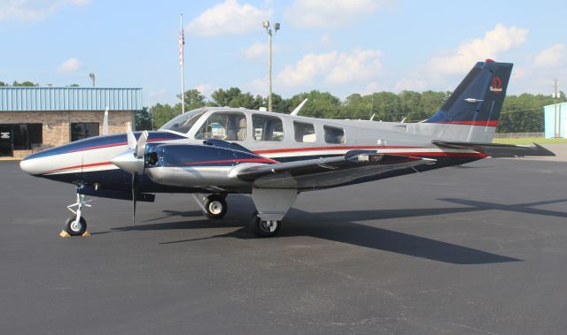 Beechcraft Baron (58) (N6745M) - A Beechcraft BE58 Baron on the Dixie Air ramp at Tuscaloosa Regional Airport, AL - June 16, 2017.