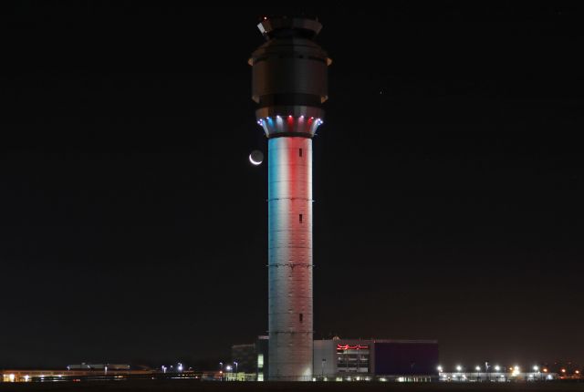 — — - Monday morning crescent moonrise behind the CLE Air Traffic Control Tower on 23 Dec 2019.