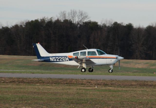 Beechcraft Sundowner (N5226M) - Departing rwy 09...