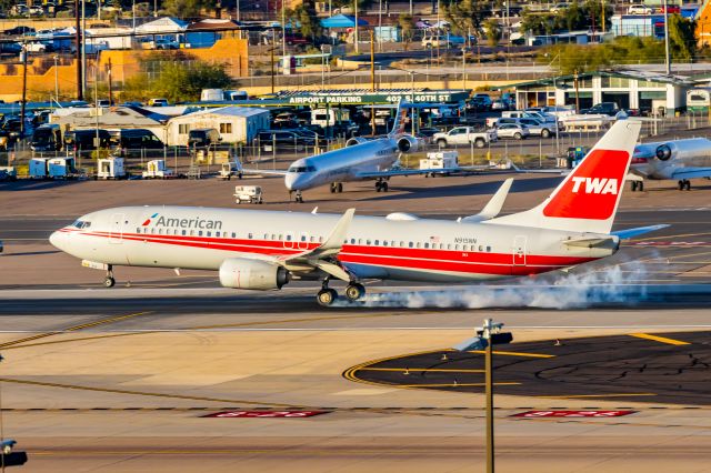 Boeing 737-800 (N915NN) - American Airlines 737-800 in TWA retro livery landing at PHX on 12/17/22. Taken with a Canon R7 and Tamron 70-200 G2 lens.