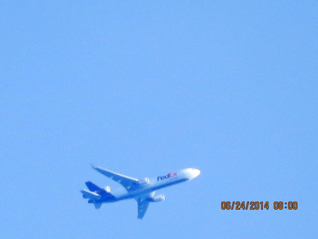 Boeing MD-11 (N599FE) - FedEx flight 568 from Memphis to Seattle over Baxter Springs Ks at 34,025 feet.