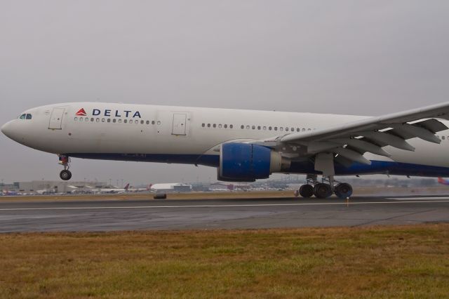 Airbus A330-300 (N807NW) - Delta 231 heavy from AMS touching down on 22L @ KBOS Logan on FlightAware.Com !