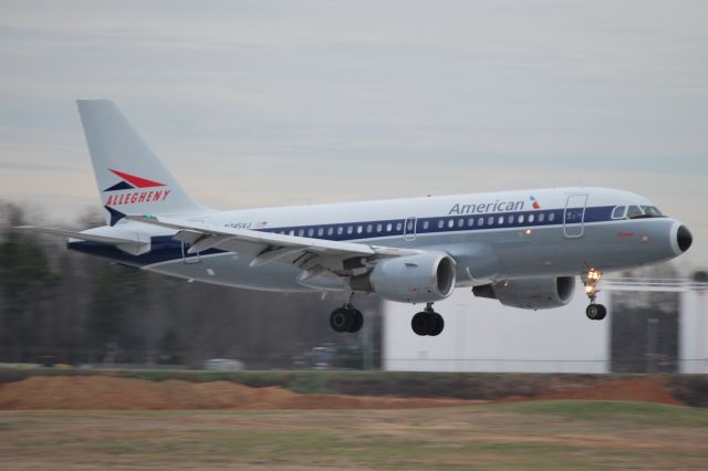 Airbus A319 (N745VJ) - Arriving runway 18C at KCLT - 1/2/15