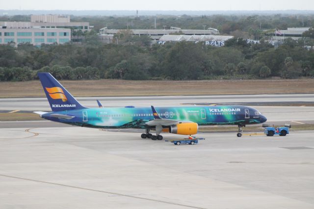 Boeing 757-200 (TF-FIU) - Watching my Grandmothers bird pull into the hardstand while it waits for departure during a 5 hour delay due to storms in Reykjavik Iceland 