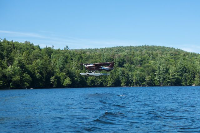 Cessna 206 Stationair (N7615N) - Helms Aero Service landing on Utowana Lake, NY