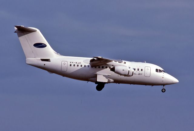 VH-NJC — - NATIONAL JET SYSTEMS - BRITISH AEROSPACE BAe-146-100 - REG : VH-NJC (CN E1013) - ADELAIDE INTERNATIONAL AIRPORT SA. AUSTRALIA - YPAD 2/11/1990