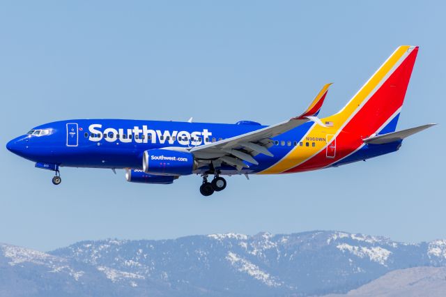 Boeing 737-700 (N968WN) - Southwest 581 passing over Mill St. on arrival from Houston-Hobby