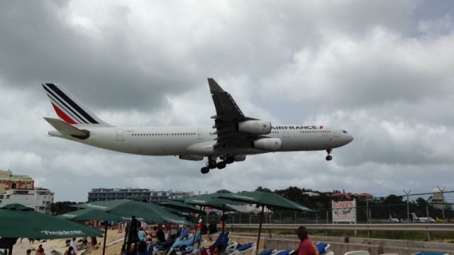 Airbus A340-300 (F-GLZJ) - Jumbo jet coming in over Maho Beach