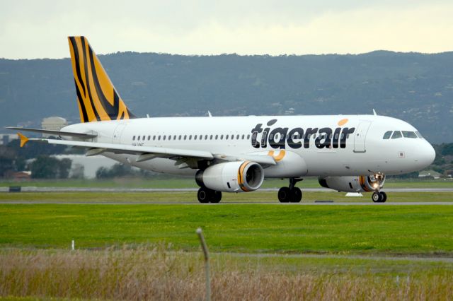 Airbus A320 (VH-VNC) - On taxiway heading for take-off on runway 05. Thursday, 19 June 2014.