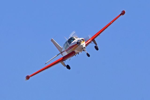 Beechcraft Bonanza (33) (N664V) - Turning to final, landing from the south at Palo Alto, California