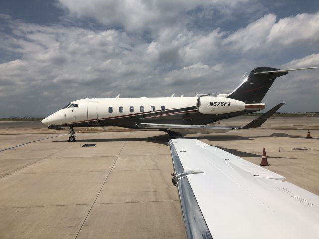 Canadair Challenger 350 (N576FX) - Just Arriving next to a Challenger 350.