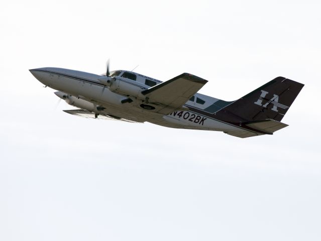 Cessna 402 (N402BK) - Take off runway 06 at Nantucket.