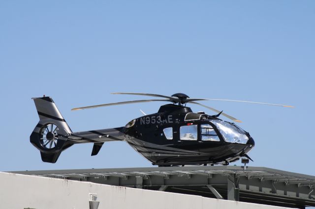 Eurocopter EC-635 (N953AE) - Parked atop Helistream's rooftop helipad at John Wayne Airport, June 25 2018. 