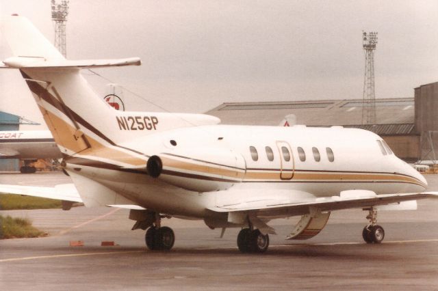 Hawker 800 (N125GP) - Seen here in May-83.br /br /Reregistered N6JB in Aug-88,br /then N6UB in Mar-91,br /then N35LM in Oct-92,br /then N195XP in Jan-96,br /then N215RS in Dec-96.br /Registration cancelled 30-Jan-18.br /Broken up at KFXE.