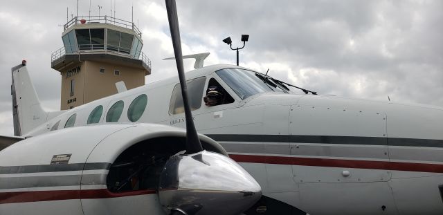 Beechcraft Queen Air (65) (N197CA) - Co-pilot clearing right engine start