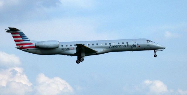 Embraer ERJ-145 (N675AE) - On final is this 2004 American Airlines Eagle Embraer ERJ-145LR in the Summer of 2021.