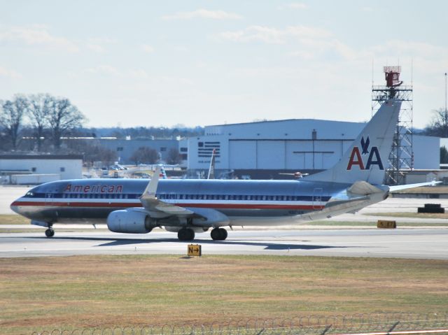 Boeing 737-800 (N921AN) - Crossing runway 36C for Concourse A - 12/10/14