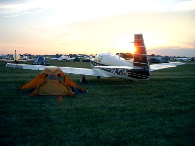 N2713W — - Camping under the wing with Markey the M20C Mooney at Fond Du Lac. Airventure 2006.