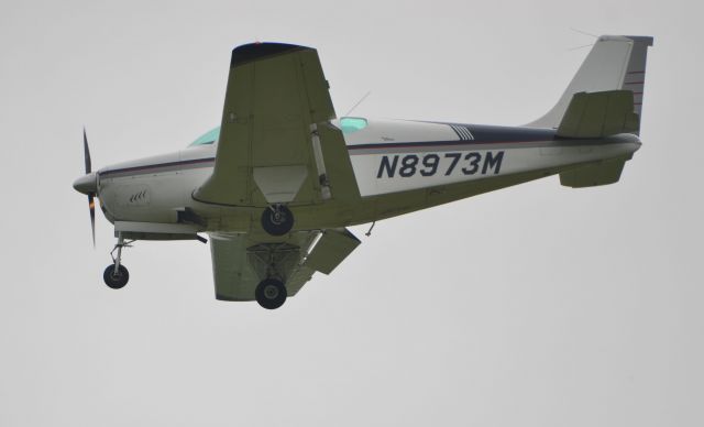 Beechcraft Bonanza (33) (N8973M) - Final approach to runway 36 at Oshkosh Airventure 2018