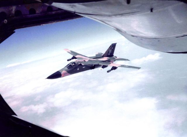 — — - F-111D approaching KC-135 to refuel.