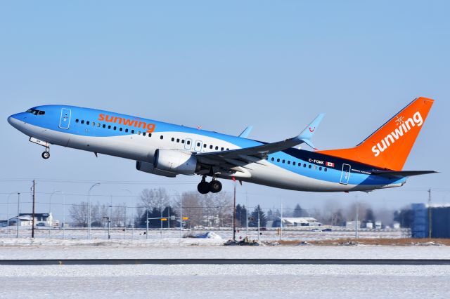 Boeing 737-800 (C-FQWK) - Sunwing Airlines Boeing 737-8K5 departing YYC on Feb 9.