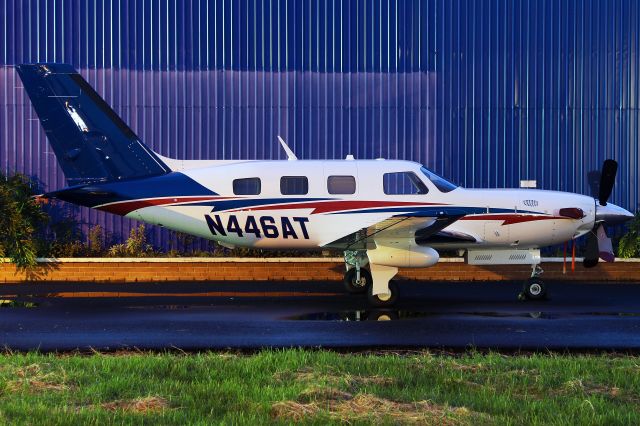 Piper Malibu Mirage (N446AT) - Interesting PA46 sitting beside the Paradise Air hangar on 14-12-15.