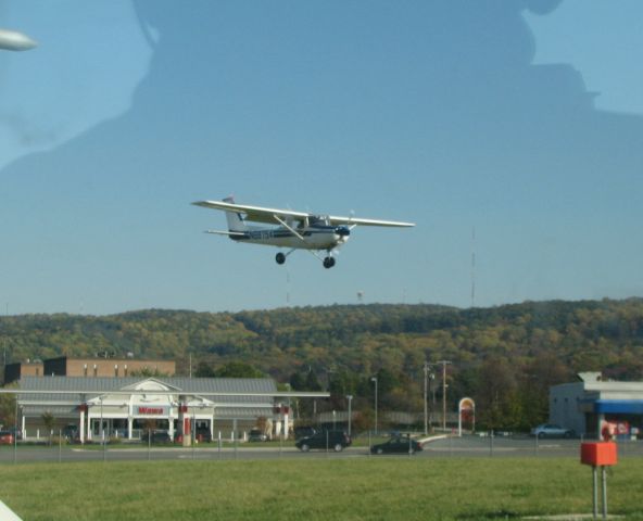 Cessna 152 (N68754) - landing at Queen City (while we were doing run-up).