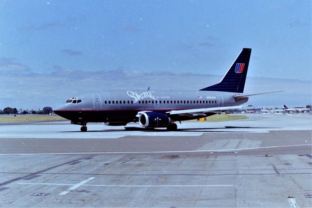 Boeing 737-500 (N924UA) - KSJC - 1999 view at San Jose, this 'Shuttle by United' 737-500 sat on the delay pad just to the right of this photo for 35 minutes before rolling off here. That was rare at SJC back then to see a 737 sit that long here.