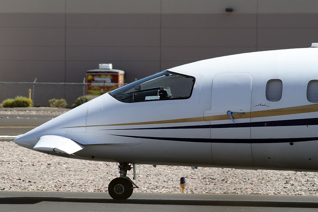 Piaggio P.180 Avanti (N134SL) - It looks like this Piaggio is having a little door latch trouble. I hope it didnt effect the flight.