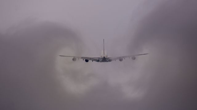 Airbus A380-800 (F-HPJC) - Air France Airbus A380-800 on the go-around after missed approach and flying through low cloud disturbing the cloud and generating vortices.