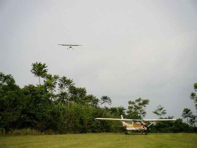 MAULE MT-7-260 Super Rocket (N1052U) - Maule MX7 landing in Dizangué Cameroon. Photo taken with a 150$ Fujifilm Z33...planning on investing in a "real" camera !