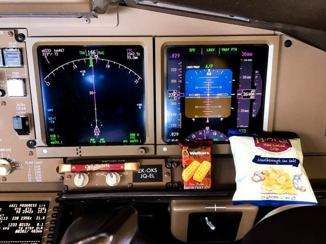 BOEING 777-300ER (ZK-OKS) - Inflight snacks are essential!