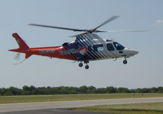 SABCA A-109 (N143CF) - CareFlite A109E2 3 takes off from Midway Airport at the 2006 Midlothian Pancake Breakfast on a call.