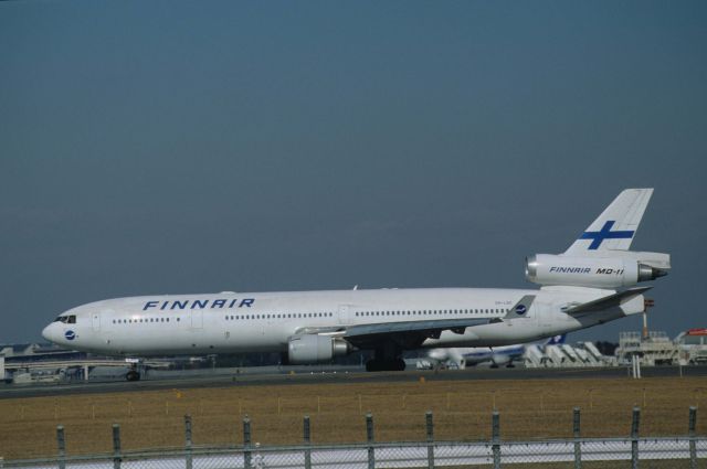 Boeing MD-11 (OH-LGC) - Departure at Narita Intl Airport Rwy34L on 1997/01/26