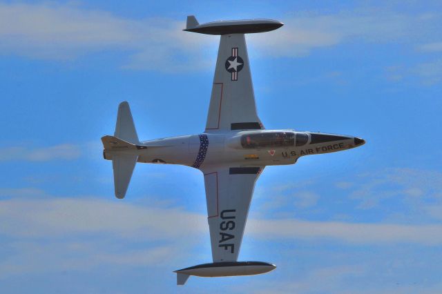 Lockheed T-33 Shooting Star (N21306) - U.S.Air Force T-33 in a slow roll for a photo op.