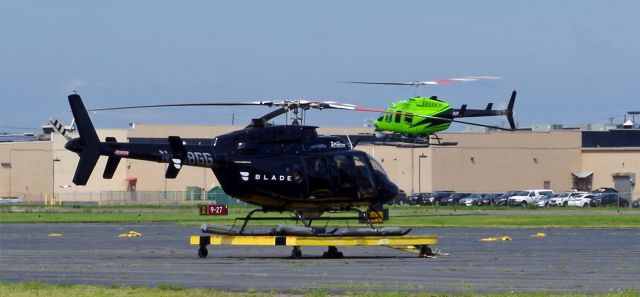 Bell JetRanger (N63L) - LINDEN AIRPORT-LINDEN, NEW JERSEY, USA-AUGUST 21, 2020: Seen about to land on Runway 27 and then to take on fuel, was this Bell Jet Ranger helicopter, registration number N63L.