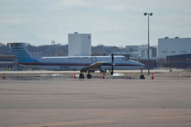 Beechcraft 1900 (N198GA) - Alpine Airline N198GA sitting in Sioux Falls SD on the GA ramp.