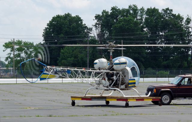 Bell UH-13H (N44SG) - LINDEN AIRPORT-LINDEN, NEW JERSEY, USA-JULY 15, 2021: Seen by RF at Linden Airport was the Bell N44SG, this time undergoing some pre-flight maintenance.