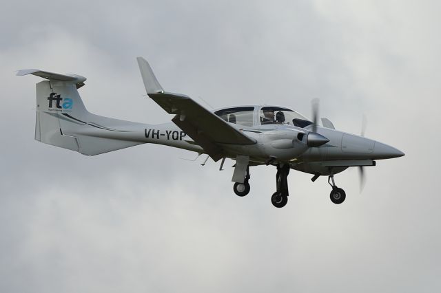 Diamond Twin Star (VH-YQP) - VH-YQP landing onto 21R at Parafield Airport.
