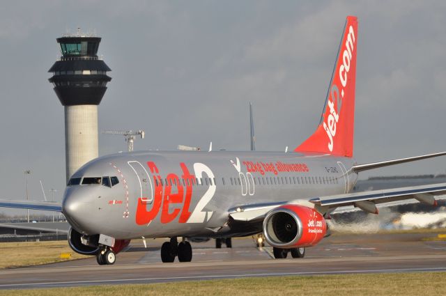 Boeing 737-700 (G-JZHC) - Turning onto 23L at Manchester . Shot taken from the Southside 