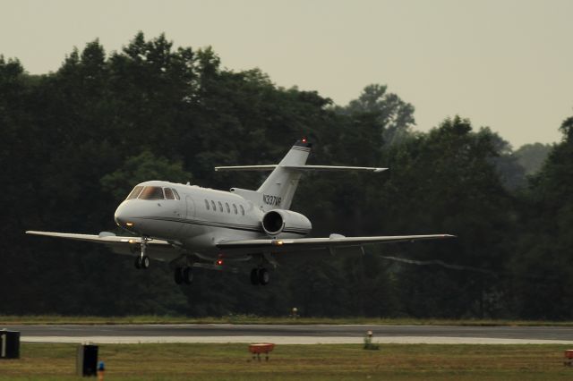 Hawker 800 (N337WR) - Taken from the Landmark ramp.  This Hawker was pulling some nice trails as it landed runway 16 at White Plains.