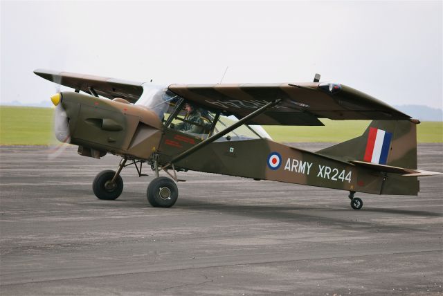 XR244 — - XR244   Auster AOP.9 of the Army Historic Aircraft Flight taxi-ing at AAC Middle Wallop after flying a few curcuits.