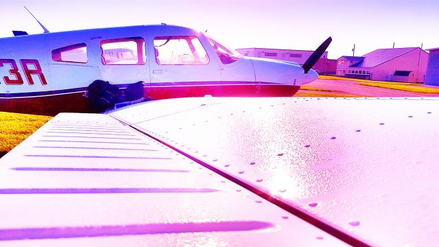 Piper Cherokee (N8113R) - Capturing some lens glare while the frost turns to condensation on a cool spring morning.