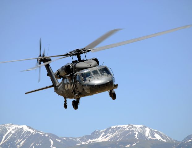 — — - This was another accidental photo of mine, but one Im glad I caught.  A fly-by from a UH-60 out of the HAATS facility in Gypsum, CO.