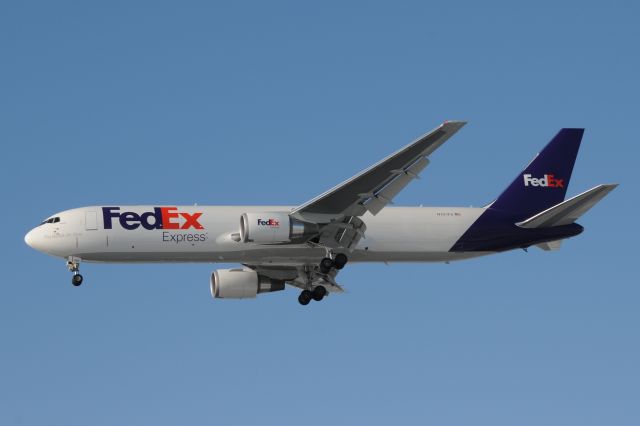 BOEING 767-300 (N101FE) - First of many new 767 s to join the FedEx fleet. Giving Santa a hand, bringing lots of packages to IND for the day-sort.